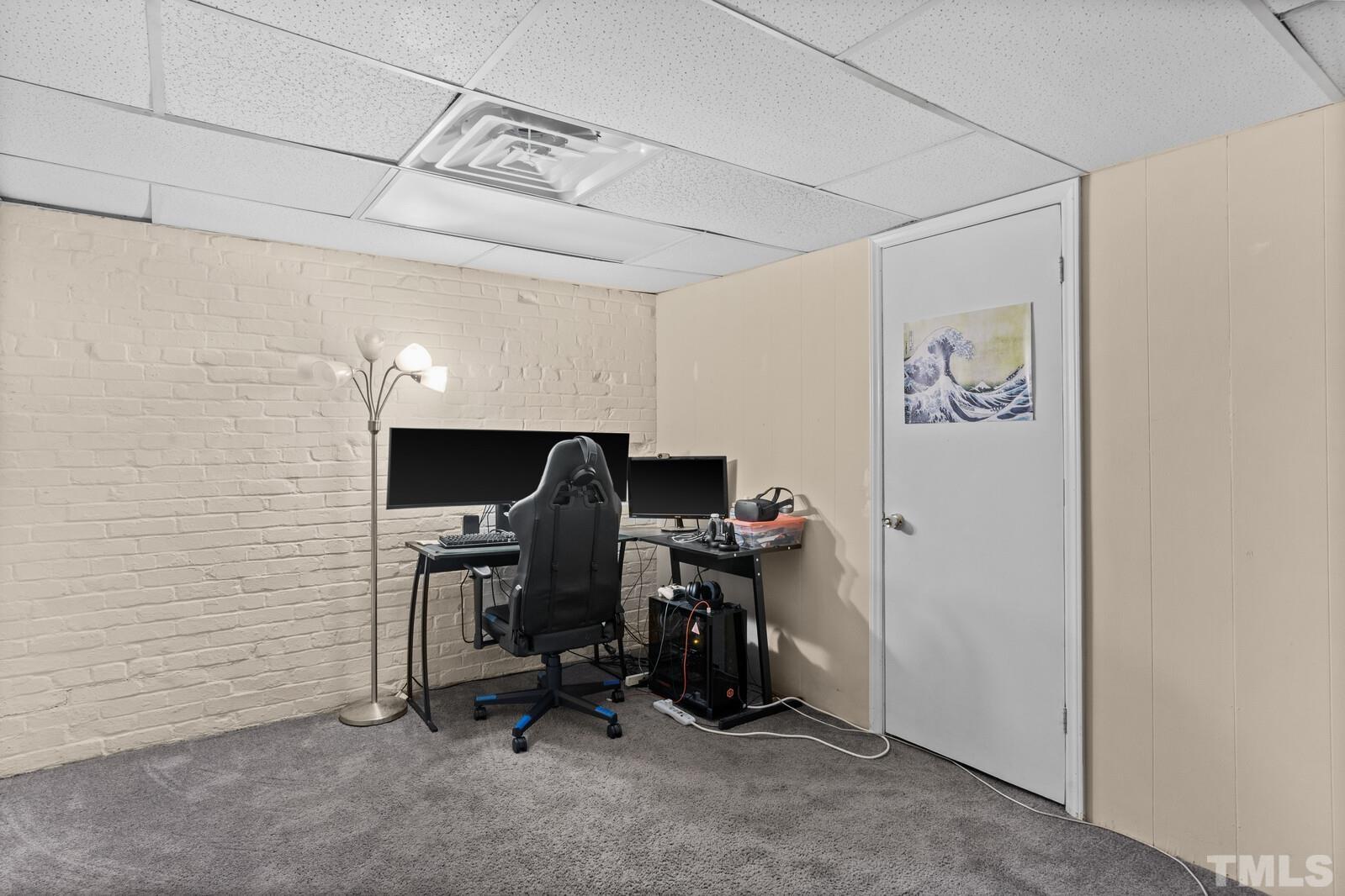 827 Athens Drive Raleigh, NC 27606 - Photo 22 of 34 a view of a workspace with furniture