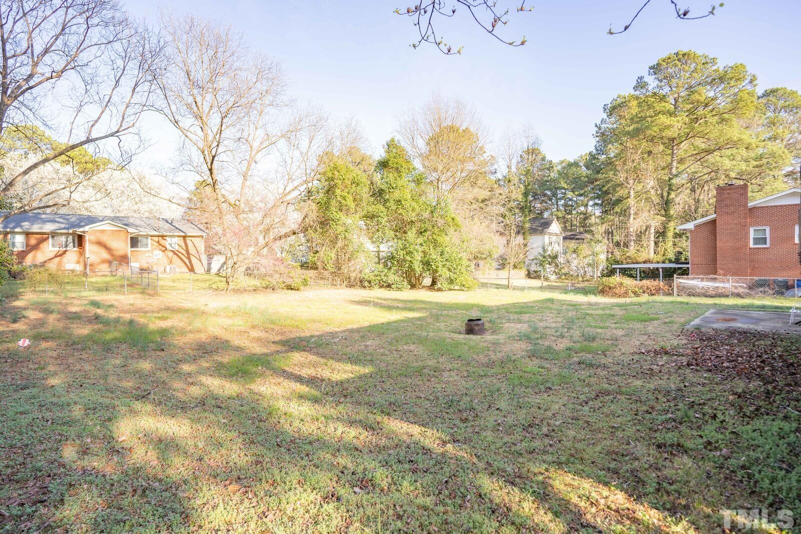 827 Athens Drive Raleigh, NC 27606 - Photo 27 of 34 a view of yard with green space