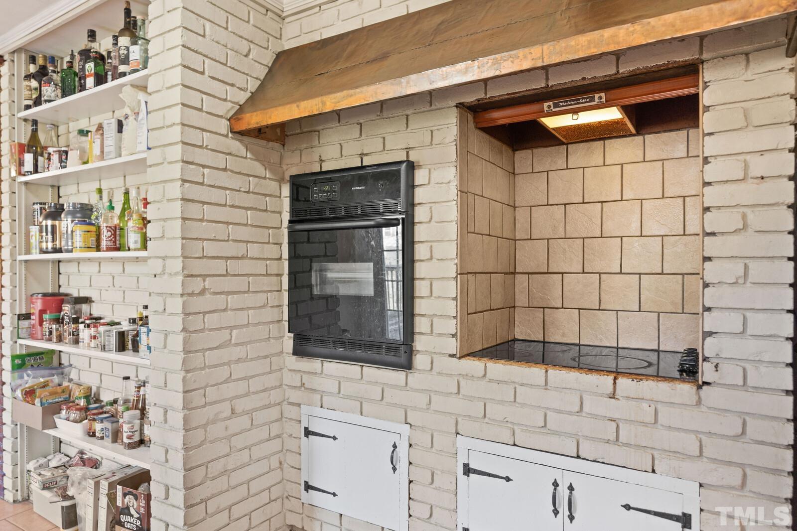 827 Athens Drive Raleigh, NC 27606 - Photo 10 of 34 a bathroom with a shower and a sink