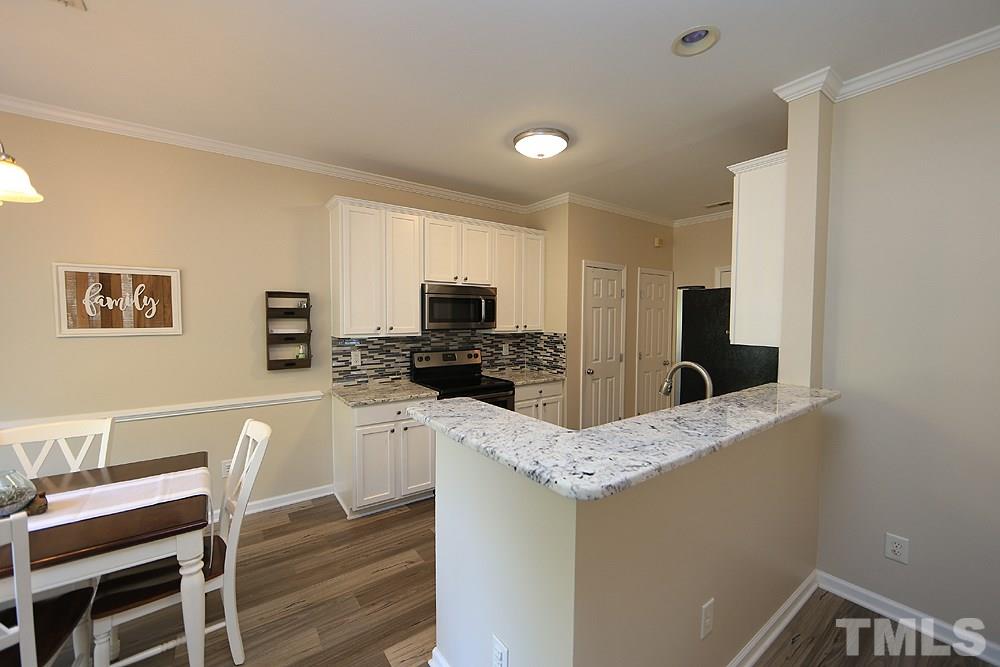 8423 Stone Mason Drive Raleigh, NC 27613 - Photo 4 of 11 Has Eat- In Area