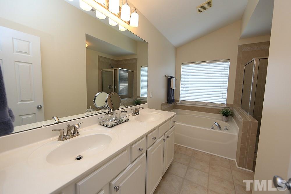 8423 Stone Mason Drive Raleigh, NC 27613 - Photo 8 of 11 Has Dual Vanity, Soaking Tub and Separate Shower