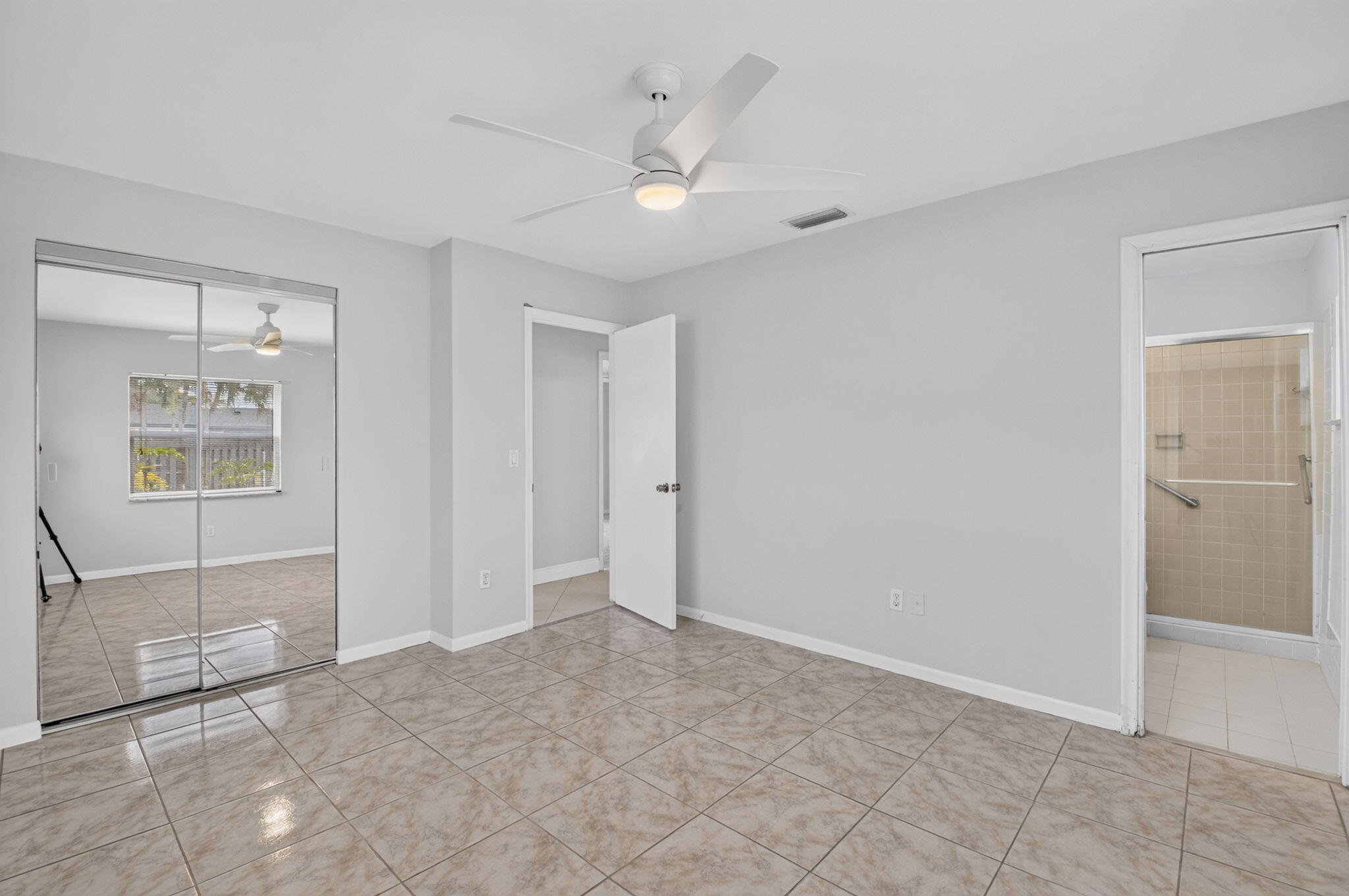 4599 Betelnut Street Boca Raton, FL 33428 - Photo 23 of 28 Primary Bedroom