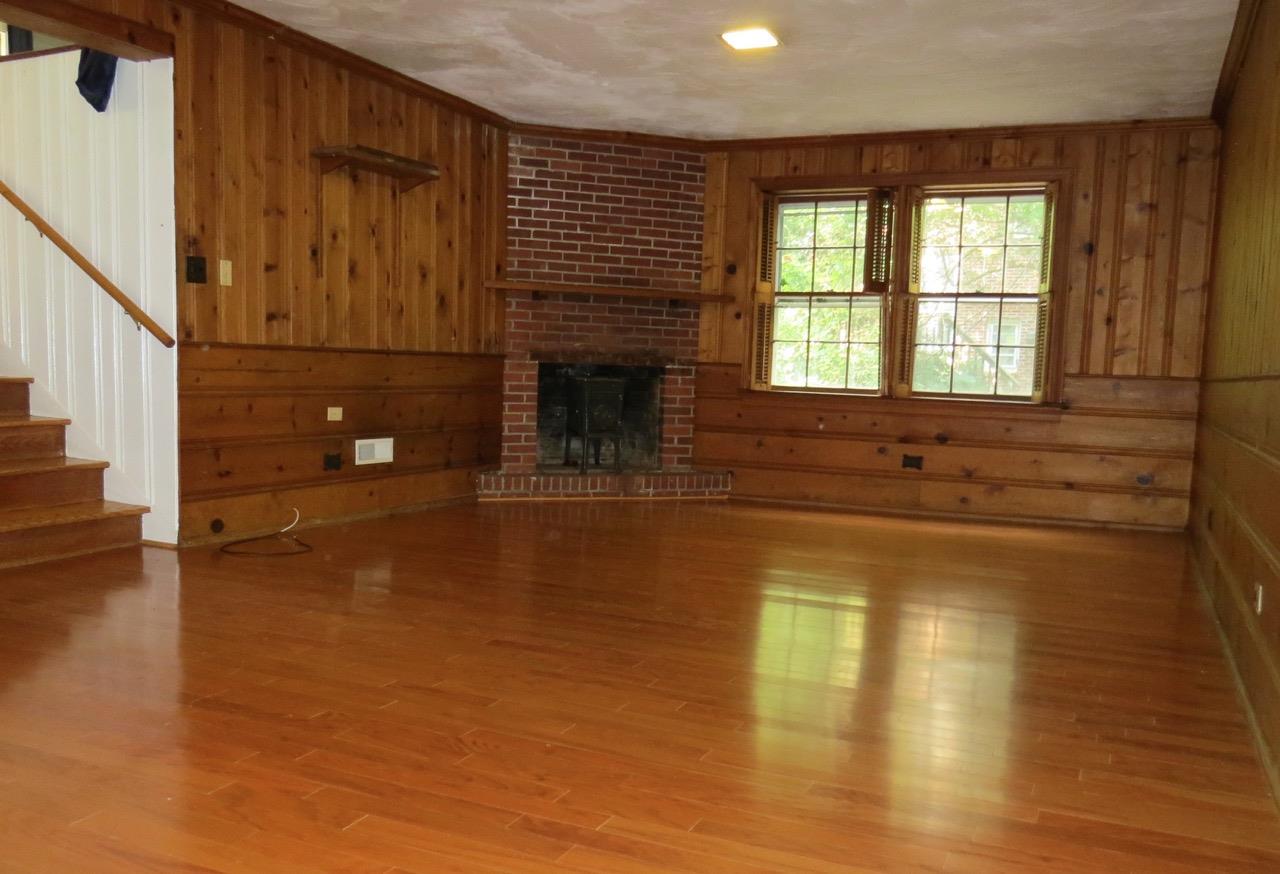 110 Buckingham Road Charlottesville, VA 22903 - Photo 5 of 25 a view of empty room with wooden floor and fan