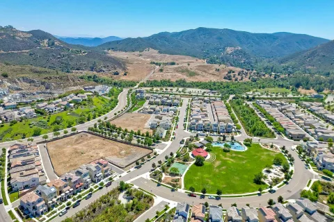 an aerial view of residential house with an outdoor space