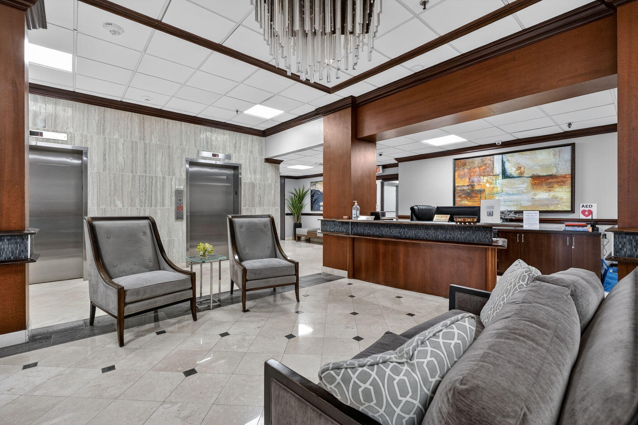 3400 North Ocean Drive, Unit 408 Singer Island, FL 33404 - Photo 13 of 31 a living room with furniture and kitchen view