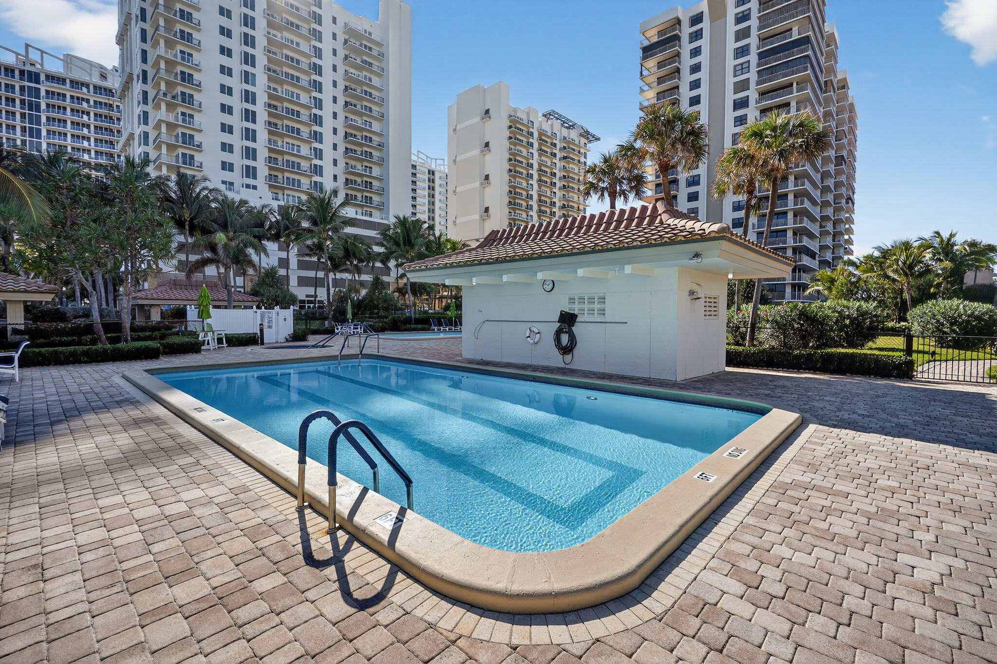 3400 North Ocean Drive, Unit 408 Singer Island, FL 33404 - Photo 23 of 31 a view of a swimming pool with a terrace