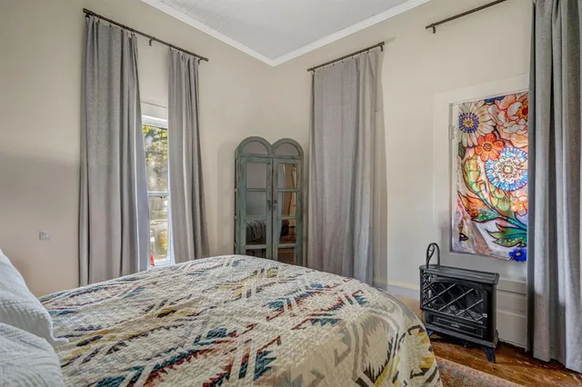 a bedroom with a bed and a closet