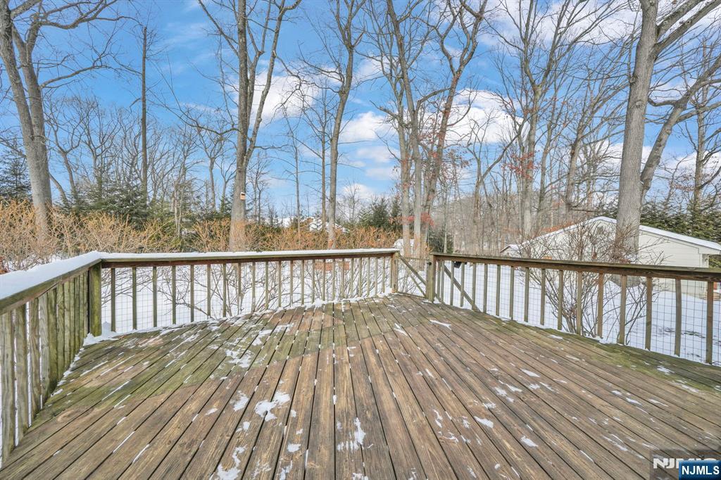 645 Wildwood Road West Northvale, NJ 07647 - Photo 29 of 35 a view of balcony with wooden floor and fence