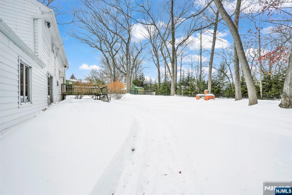 645 Wildwood Road West Northvale, NJ 07647 - Photo 30 of 35 a view of snow on the outside of a house