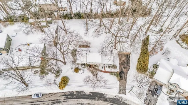 a view of yard covered with snow