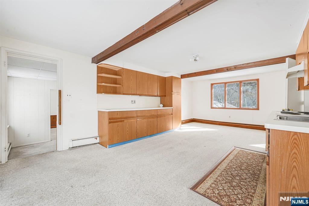 645 Wildwood Road West Northvale, NJ 07647 - Photo 7 of 35 a view of an empty room with a window