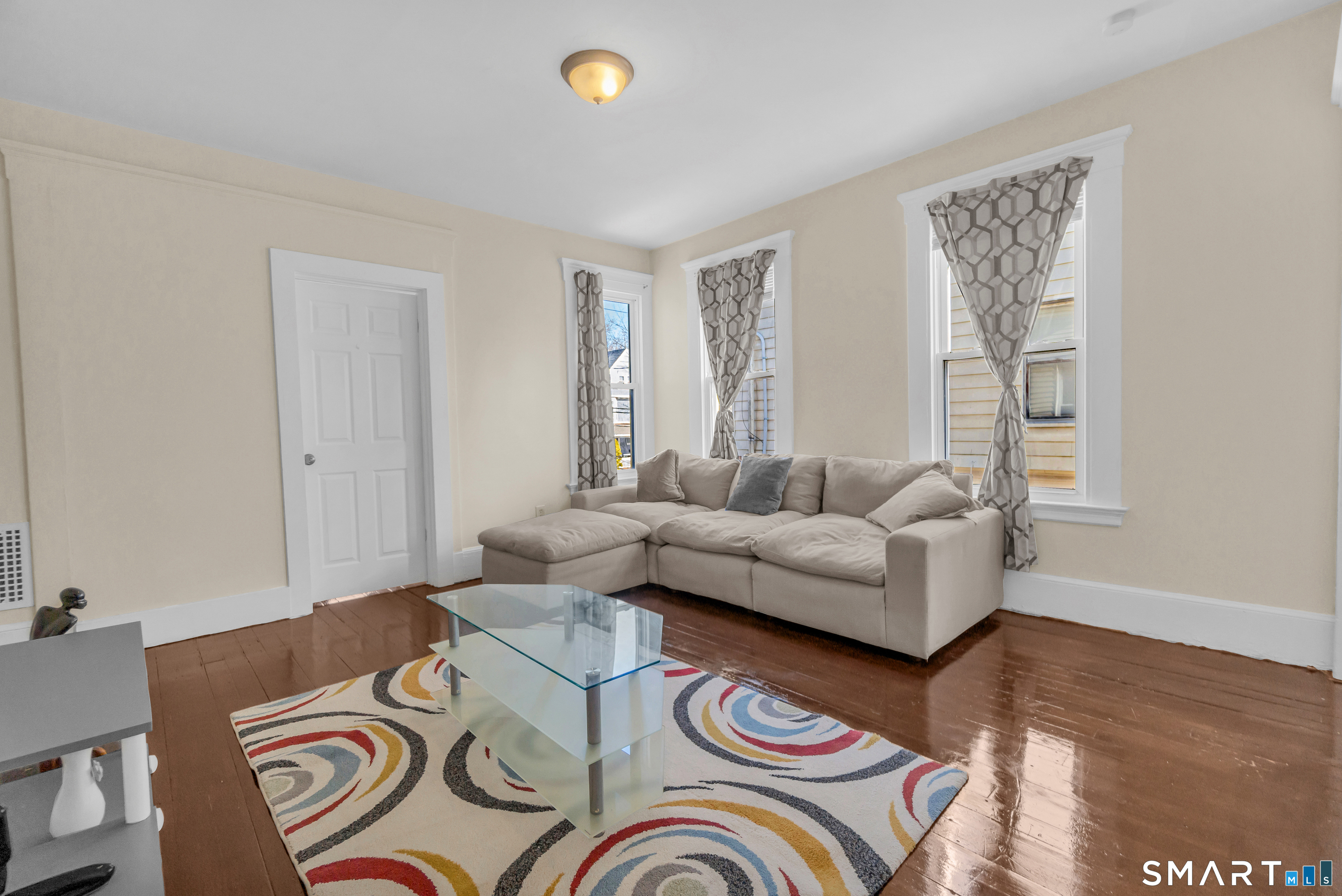 766 George Street New Haven, CT 06511 - Photo 1 of 23 a living room with furniture and a window