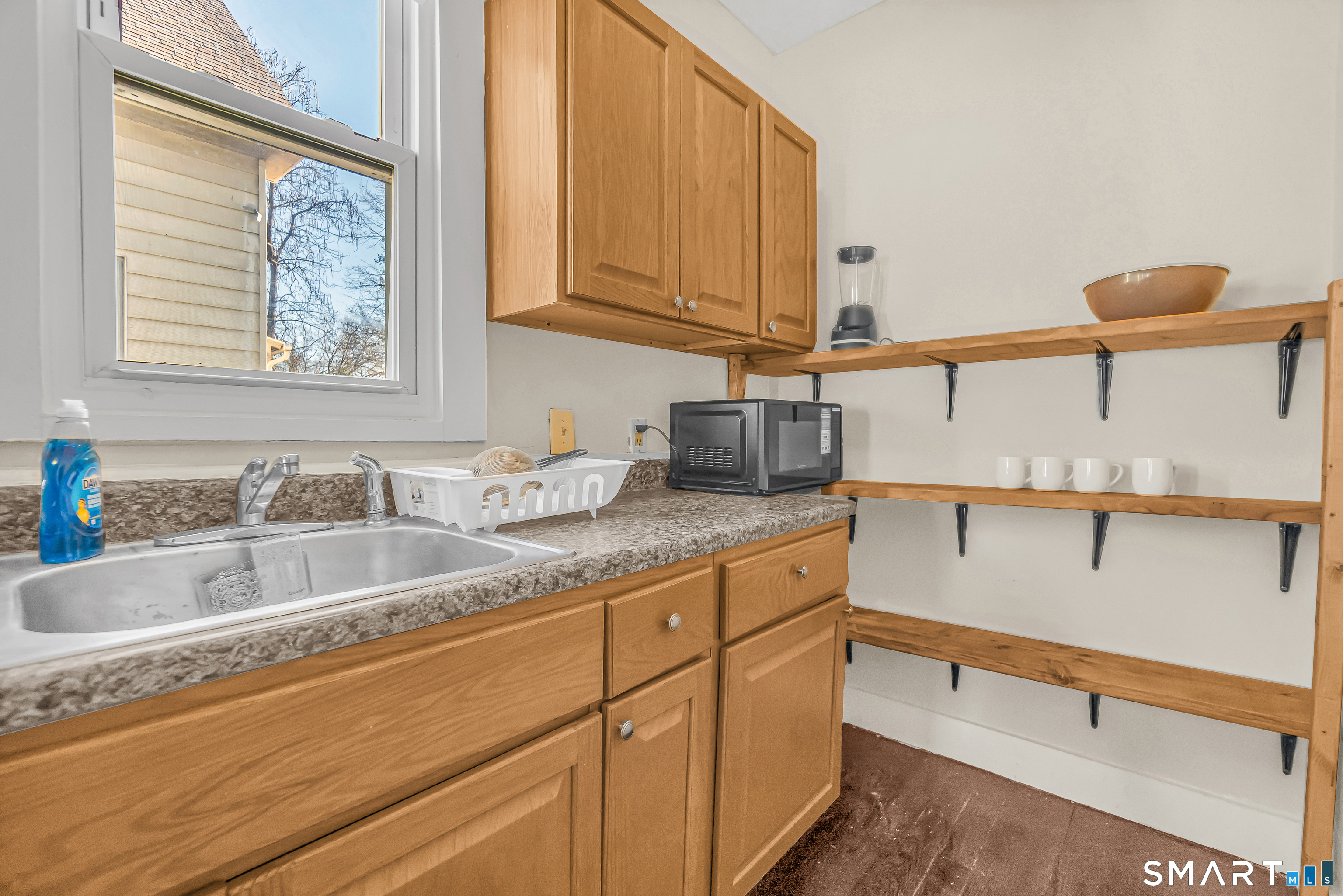 766 George Street New Haven, CT 06511 - Photo 13 of 23 a bathroom with a sink and a mirror