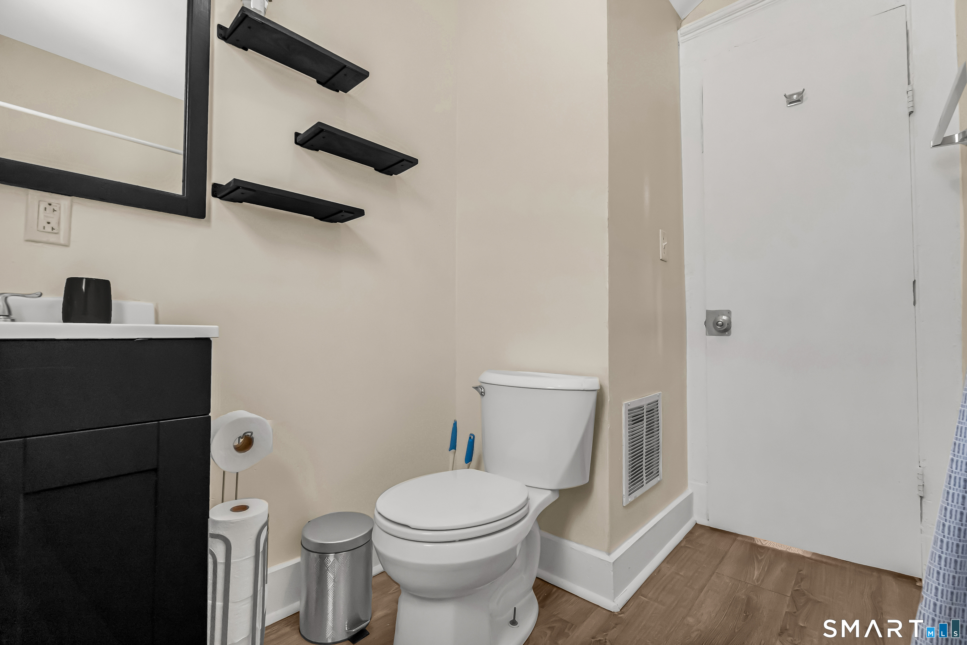 766 George Street New Haven, CT 06511 - Photo 14 of 23 a white toilet sitting next to a bathroom sink