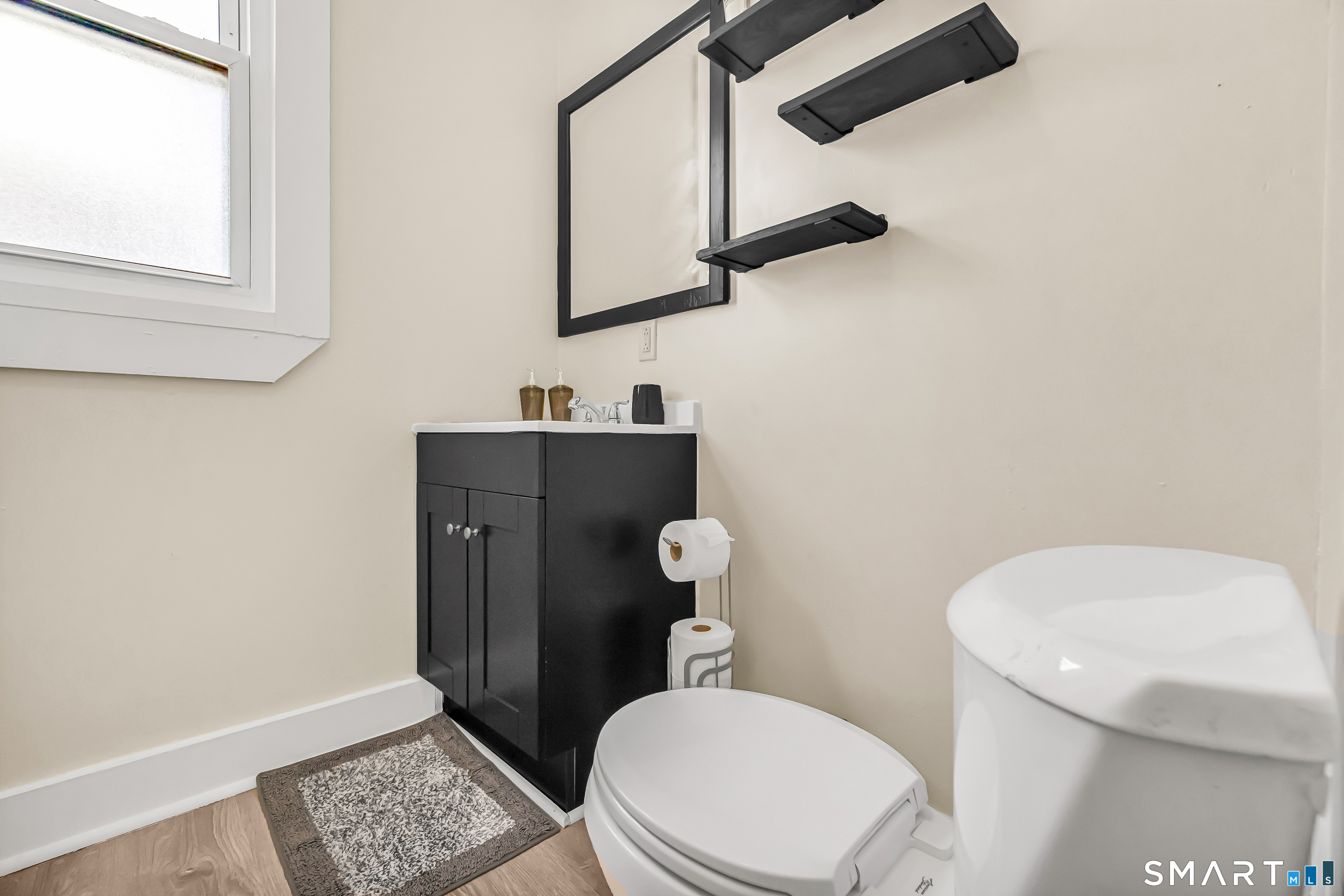 766 George Street New Haven, CT 06511 - Photo 15 of 23 a white toilet sitting next to a bathroom sink