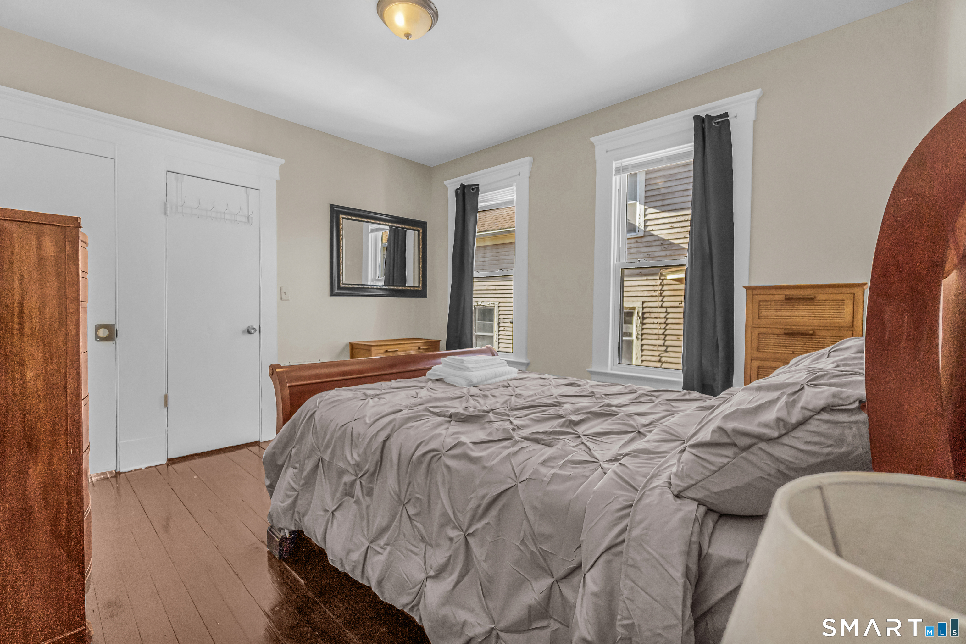 766 George Street New Haven, CT 06511 - Photo 19 of 23 a bedroom with a bed and wooden floor