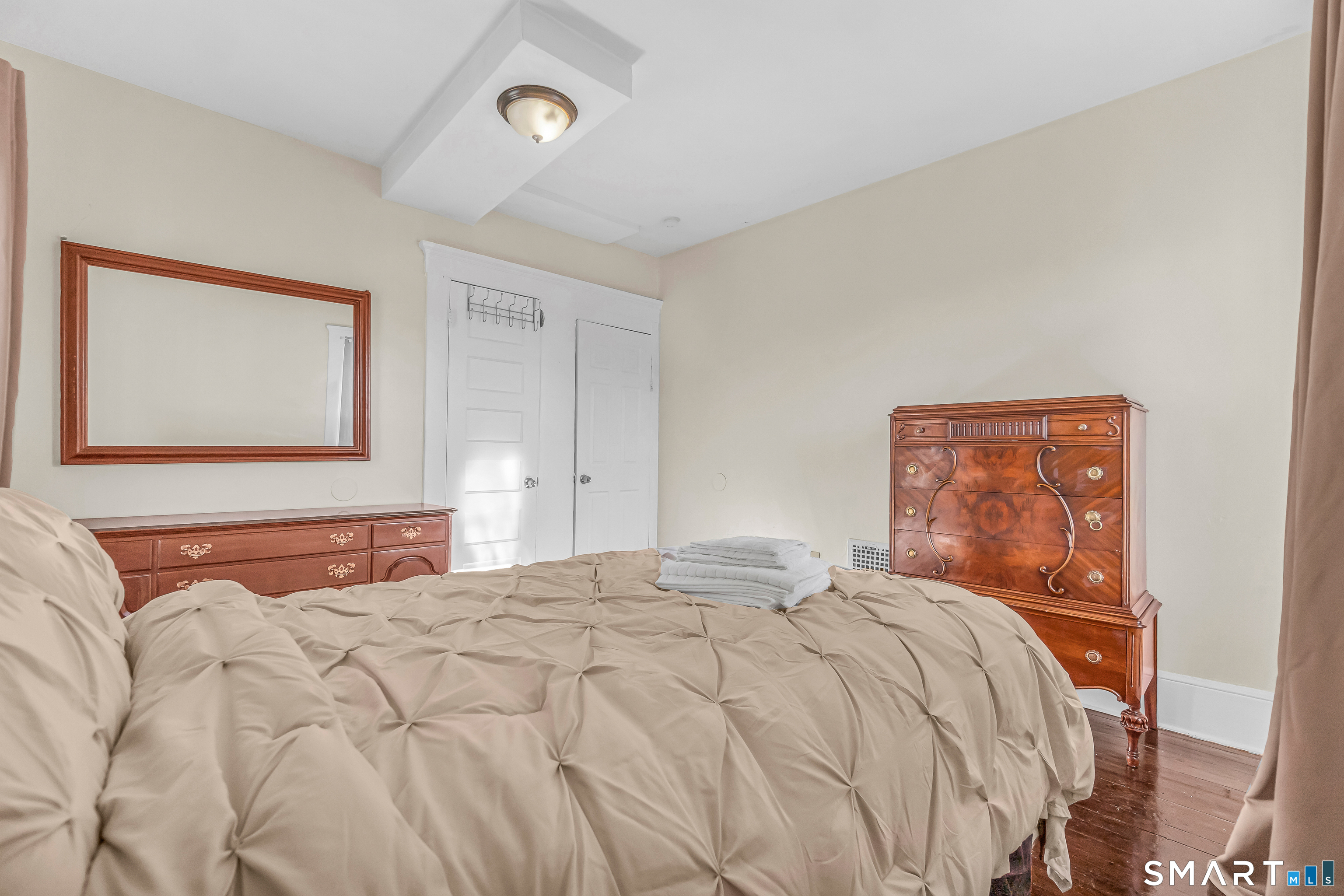 766 George Street New Haven, CT 06511 - Photo 21 of 23 a bedroom with a bed and a painting on the wall