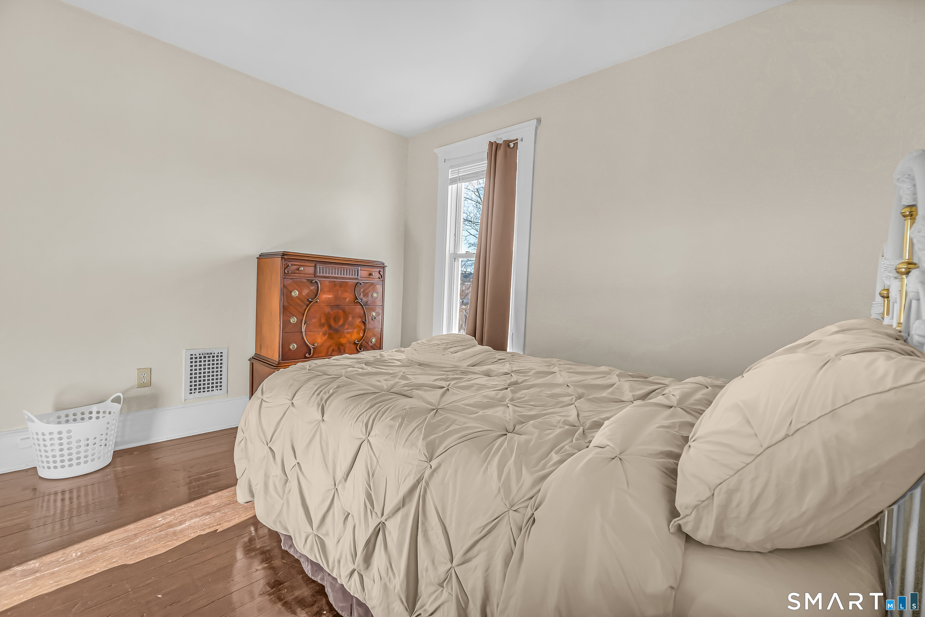 766 George Street New Haven, CT 06511 - Photo 22 of 23 a bedroom with a bed and a wooden floor