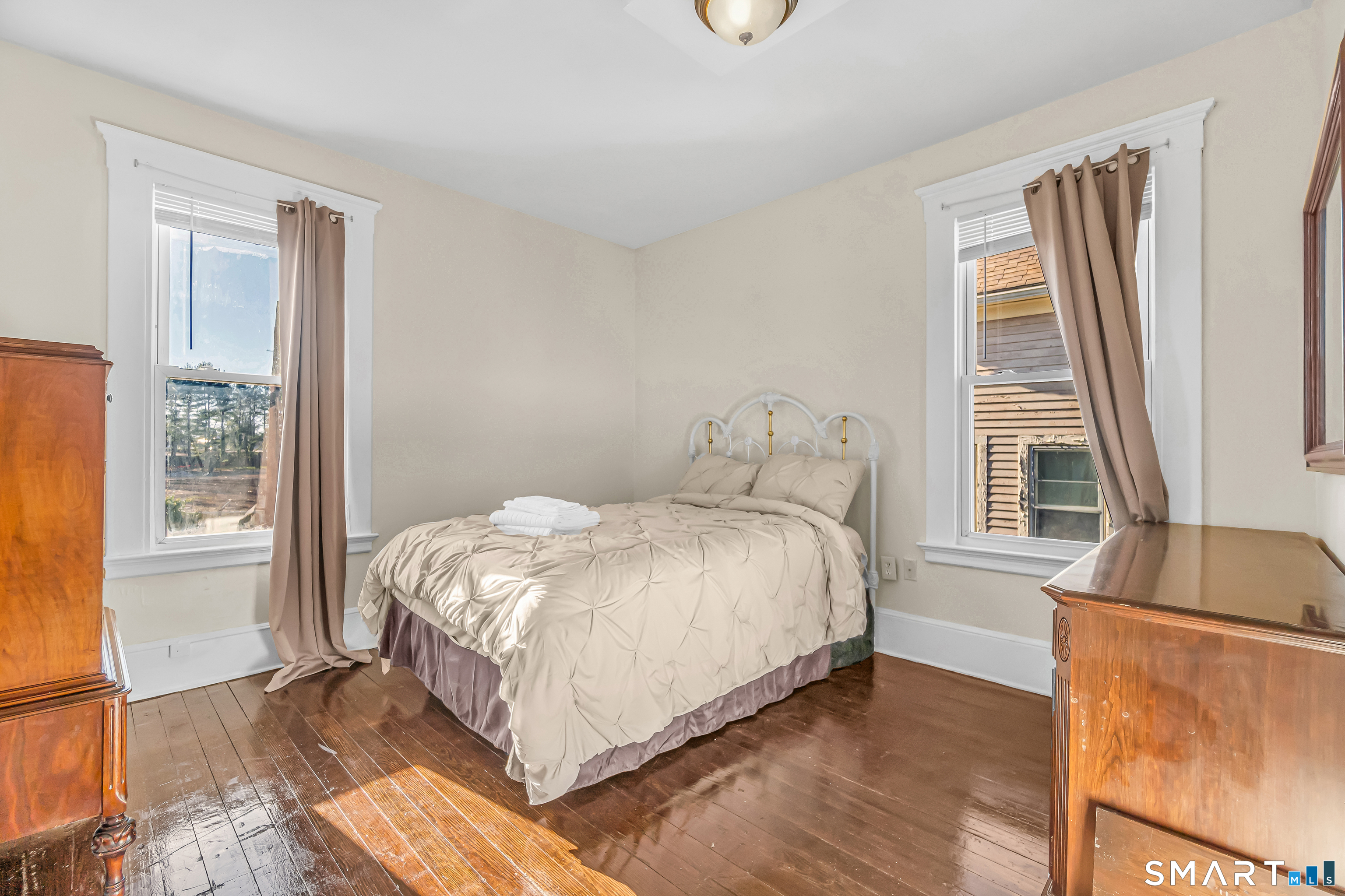 766 George Street New Haven, CT 06511 - Photo 23 of 23 a bedroom with a bed and a large window