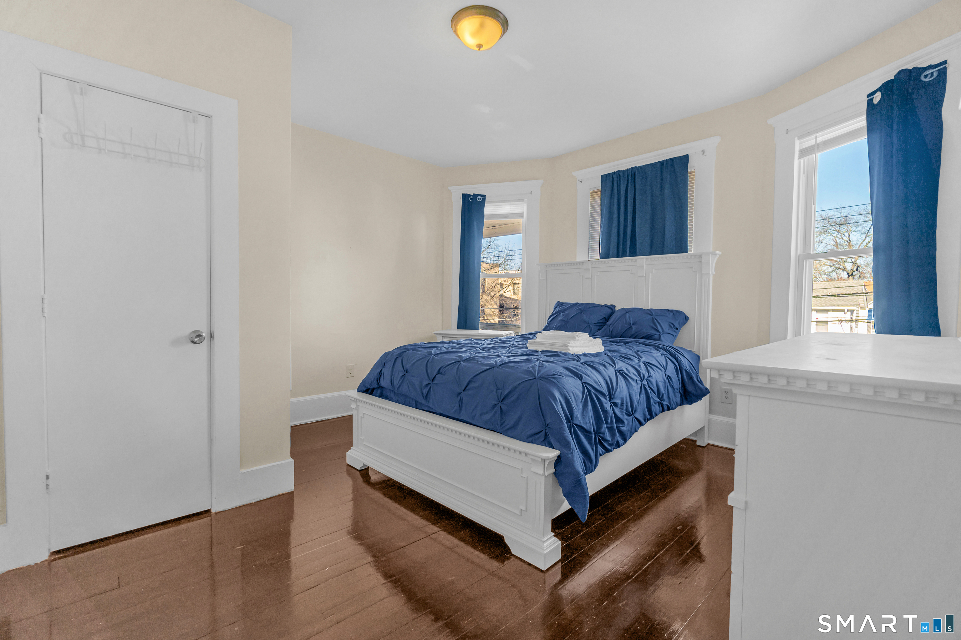 766 George Street New Haven, CT 06511 - Photo 5 of 23 a spacious bedroom with a bed and a window