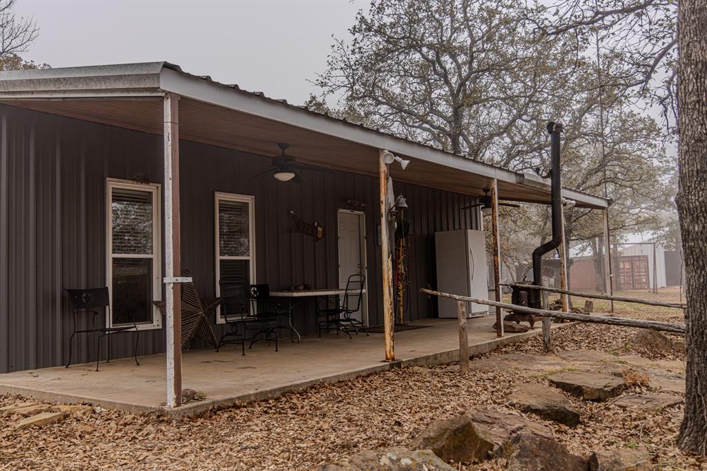 2946 Fm 52 Graford, TX 76449 - Photo 5 of 40 a view of house with backyard