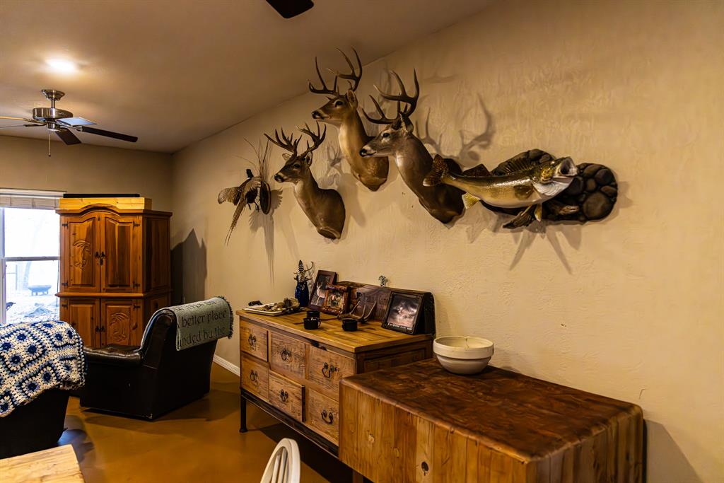 2946 Fm 52 Graford, TX 76449 - Photo 40 of 40 a kitchen with stainless steel appliances granite countertop a stove a sink and a microwave