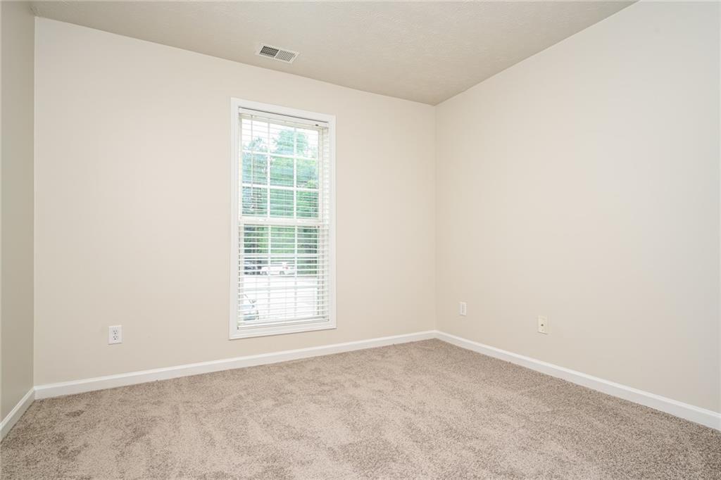 4468 Abram Way Conley, GA 30288 - Photo 14 of 23 an empty room with a window