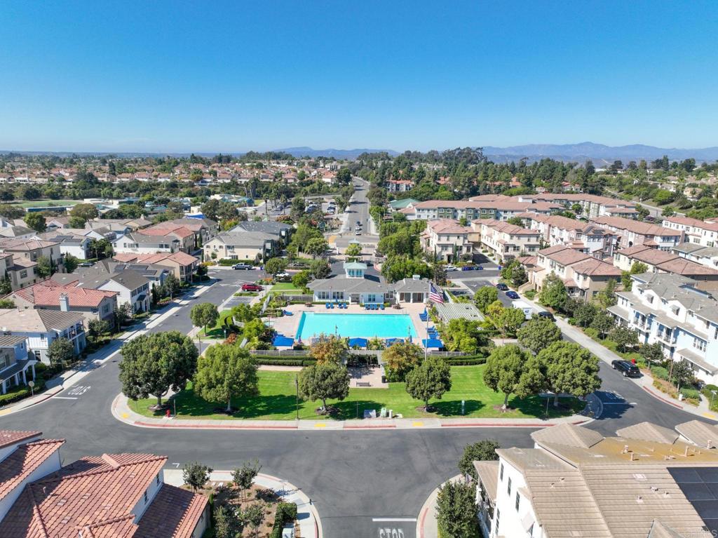 4367 Pacifica Way, Unit 2 Oceanside, CA 92056 - Photo 2 of 37 an aerial view of a city with lots of residential buildings