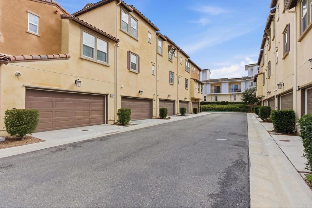 4367 Pacifica Way, Unit 2 Oceanside, CA 92056 - Photo 26 of 37 a view of a street with a building