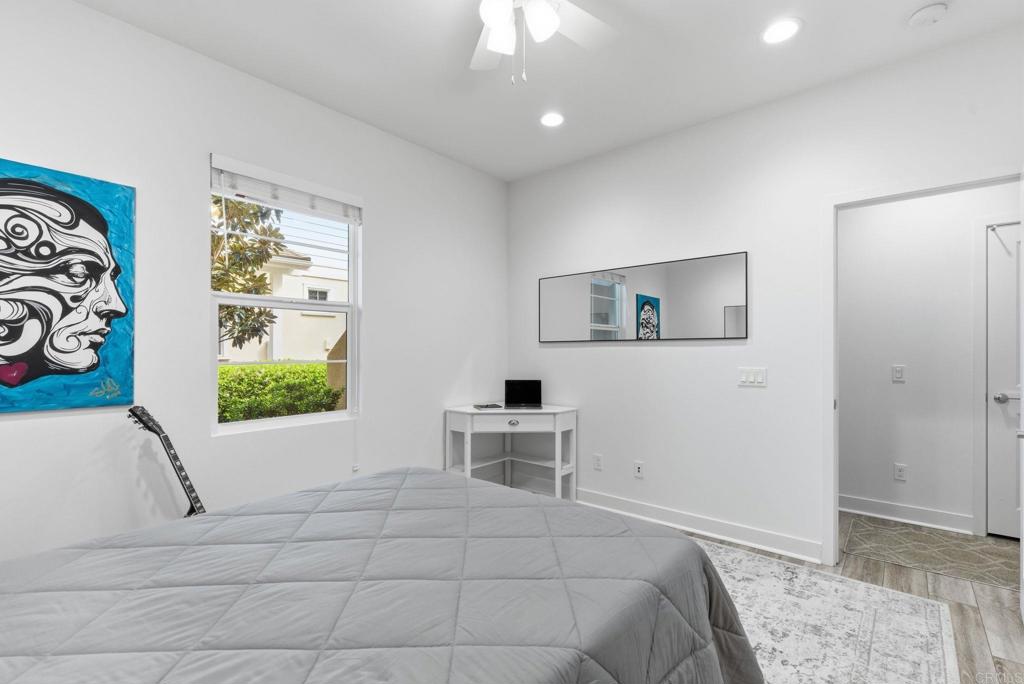 4367 Pacifica Way, Unit 2 Oceanside, CA 92056 - Photo 8 of 37 a bedroom with a bed and a window