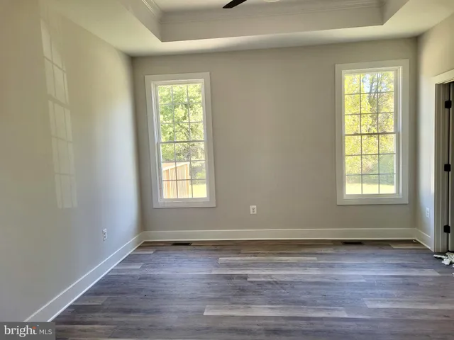 a view of a building with a big yard