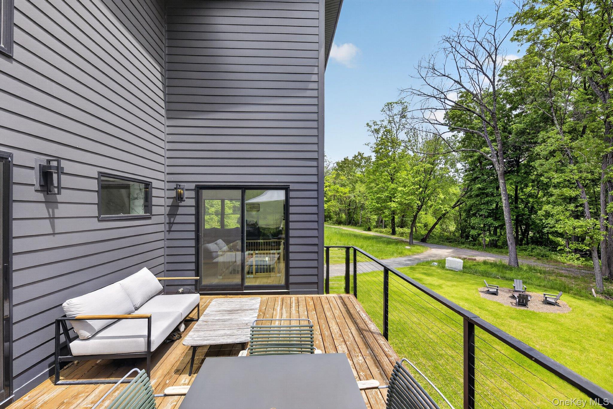 739 Old Post Road New Paltz, NY 12561 - Photo 36 of 47 Expansive wood-finish deck with cable railing