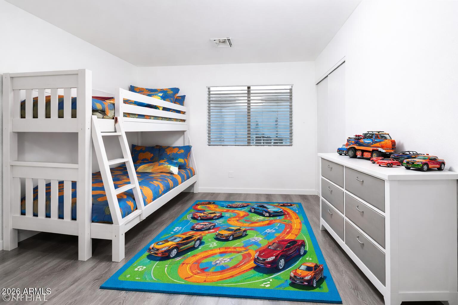 450 South Crismon Road Mesa, AZ 85208 - Photo 11 of 12 a room with toys and a baby crib