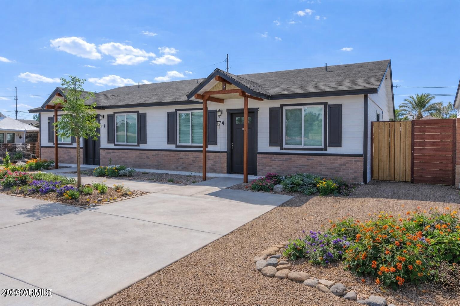 450 South Crismon Road Mesa, AZ 85208 - Photo 12 of 12 a front view of a house with garden