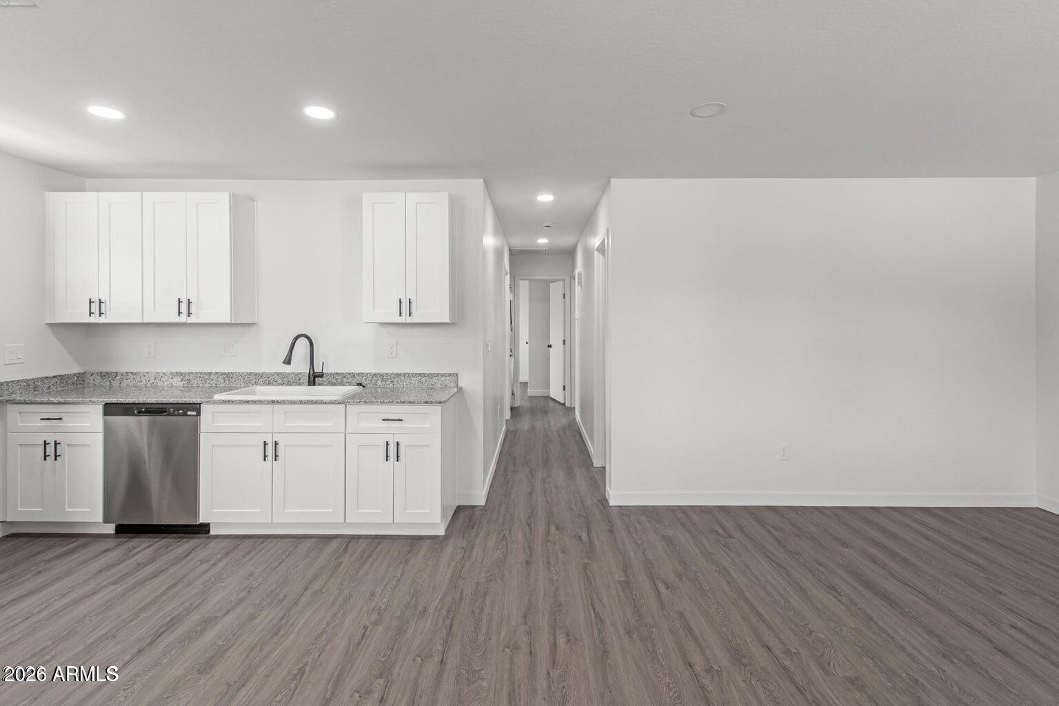 450 South Crismon Road Mesa, AZ 85208 - Photo 4 of 12 a view of a kitchen with wooden floor