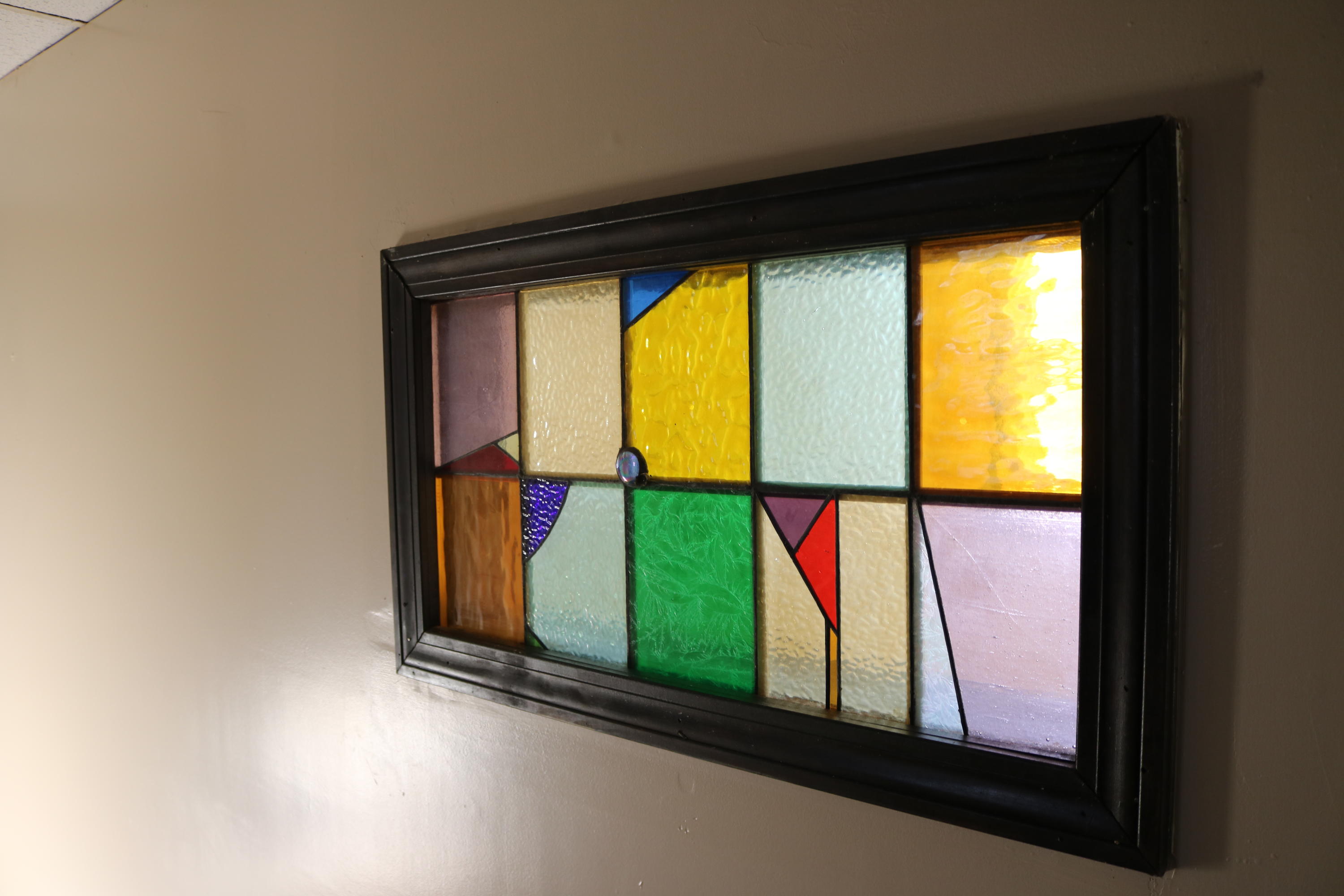 627 Webber Hill Road Kennebunk, ME 04043 - Photo 17 of 23 Stained glass in basement
