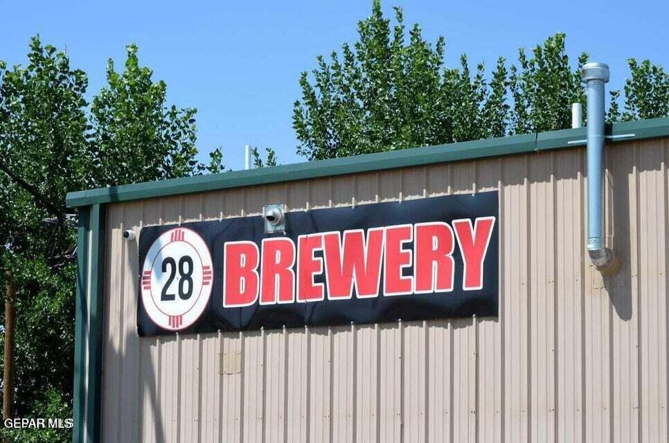 10092 Provencio Road Chamberino, NM 88027 - Photo 6 of 6 a view of sign board with a wooden fence
