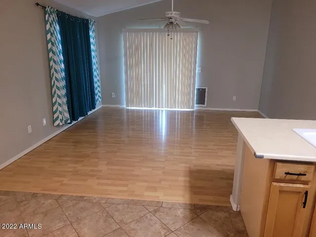 a view of a livingroom with wooden floor