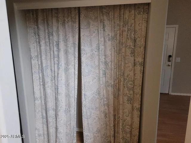 a view of an house with backyard and a slide