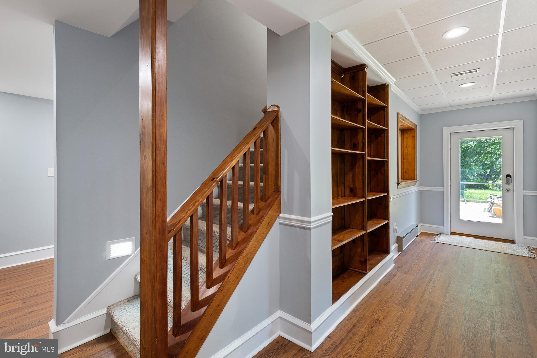 1 Ridge Run Road Chadds Ford, PA 19317 - Photo 31 of 56 Stairway from Main Floor with Wall of Shelving