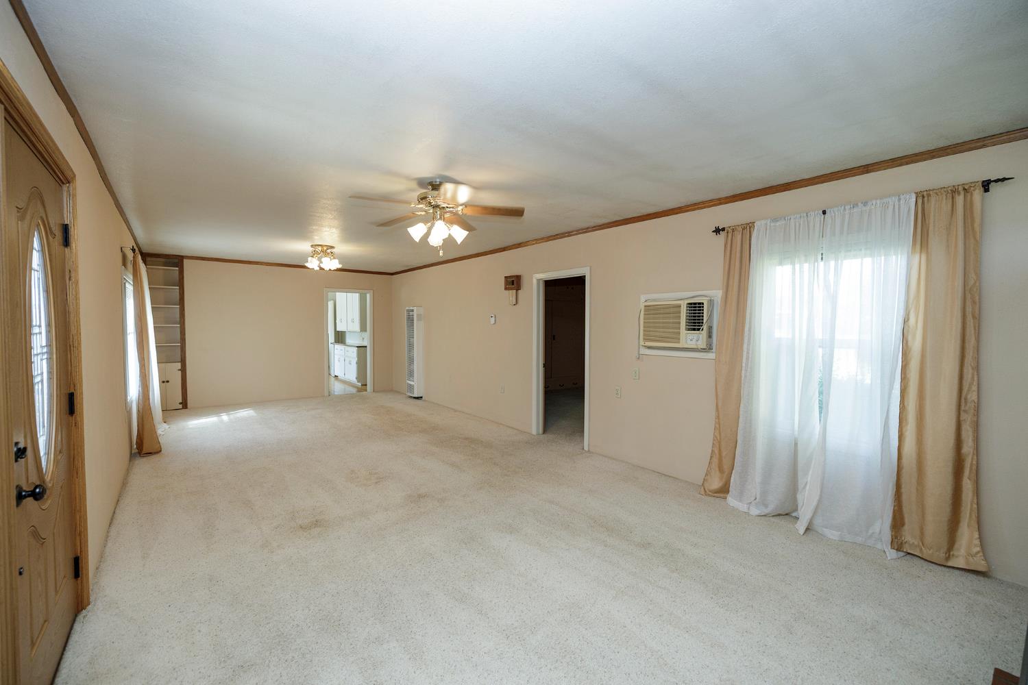 4541 North Gratton Road Denair, CA 95316 - Photo 21 of 75 a view of a big room with closet and chandelier fan