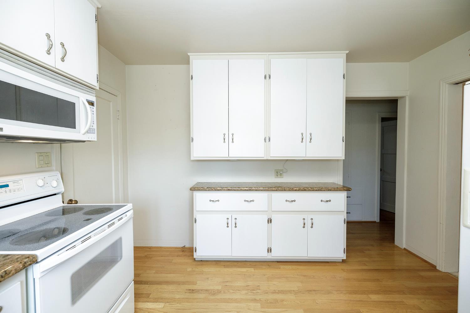 4541 North Gratton Road Denair, CA 95316 - Photo 28 of 75 a kitchen with a stove and a microwave