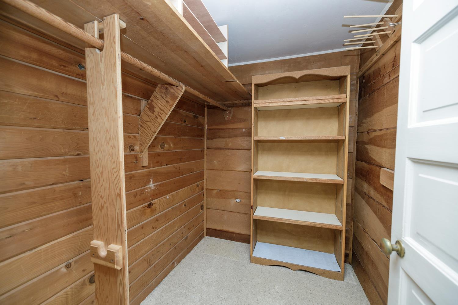 4541 North Gratton Road Denair, CA 95316 - Photo 31 of 75 a view of walk in closet with empty racks