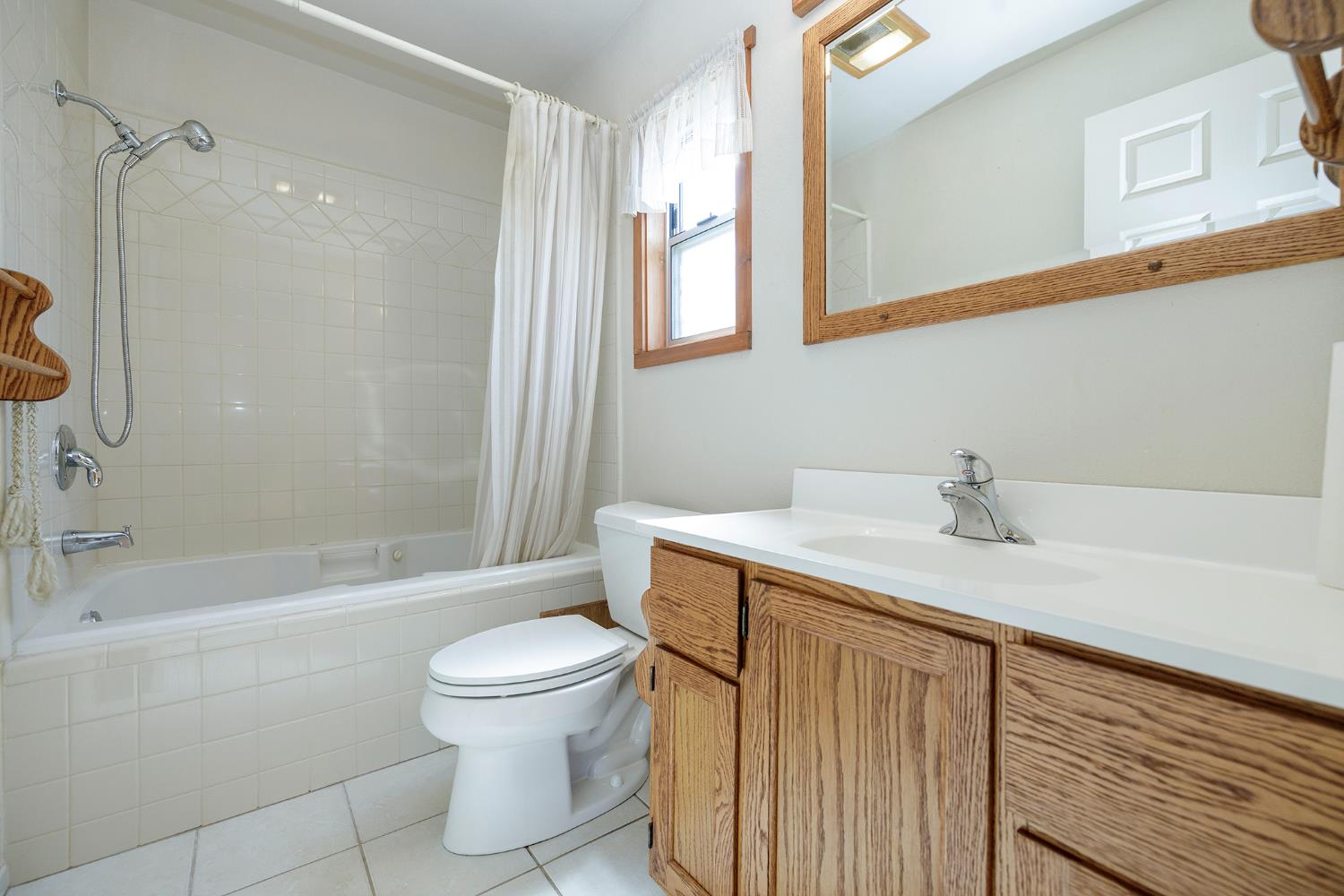 4541 North Gratton Road Denair, CA 95316 - Photo 51 of 75 a bathroom with a sink a toilet and shower