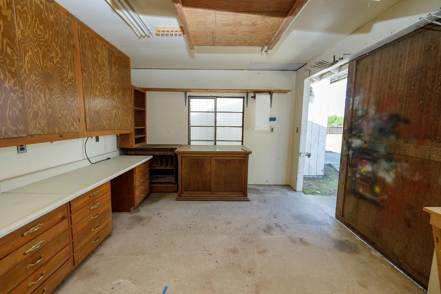 4541 North Gratton Road Denair, CA 95316 - Photo 71 of 75 a large kitchen with a sink and a large window