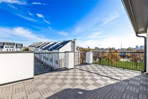 a balcony with a bench