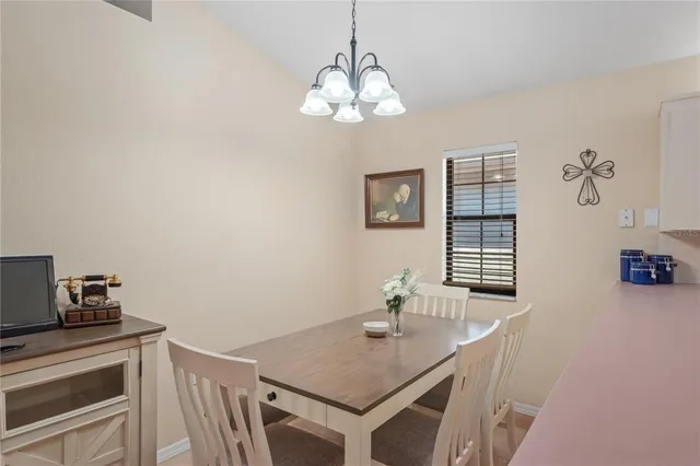 a view of a dining room with furniture