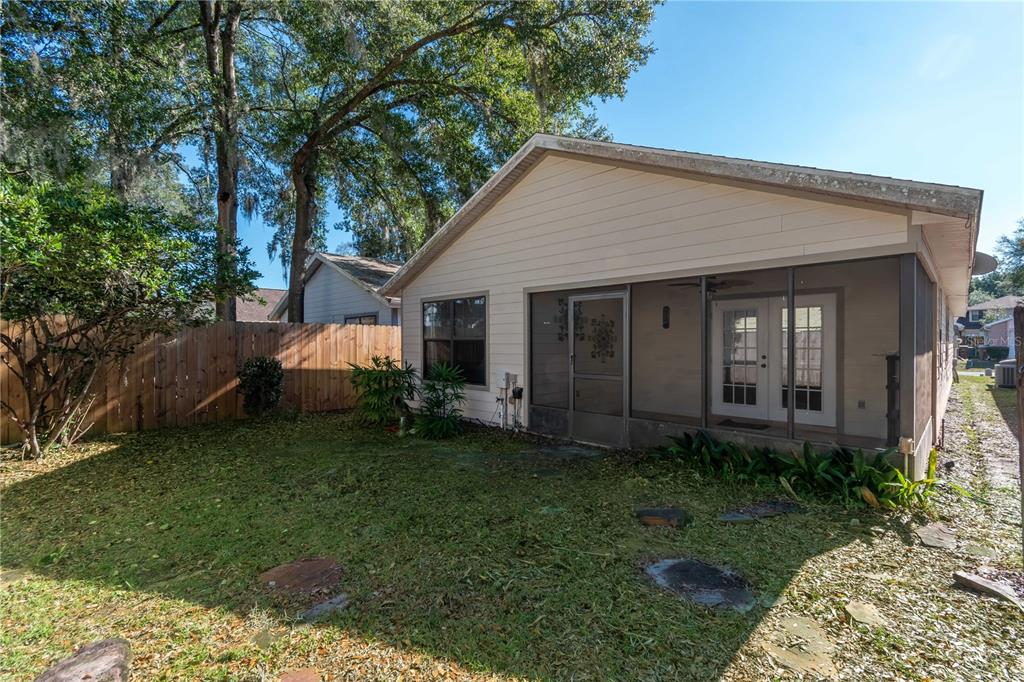 3911 Northeast 22nd Street Ocala, FL 34470 - Photo 36 of 46 a view of a house with a yard