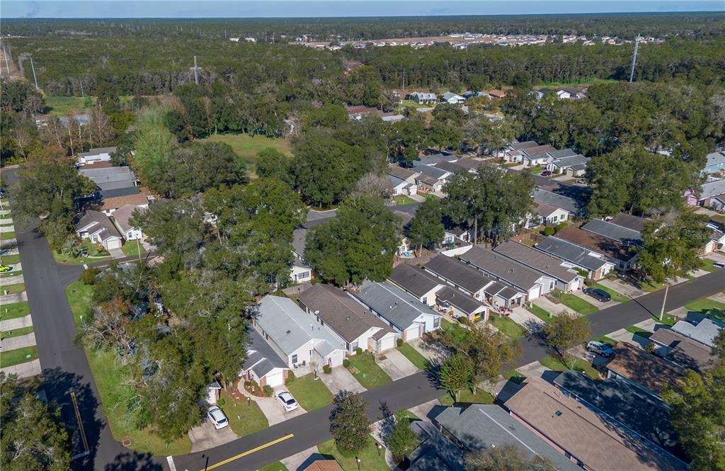 3911 Northeast 22nd Street Ocala, FL 34470 - Photo 44 of 46 an aerial view of residential houses with outdoor space