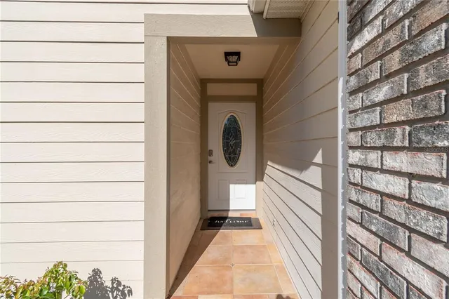 a view of a door and a window